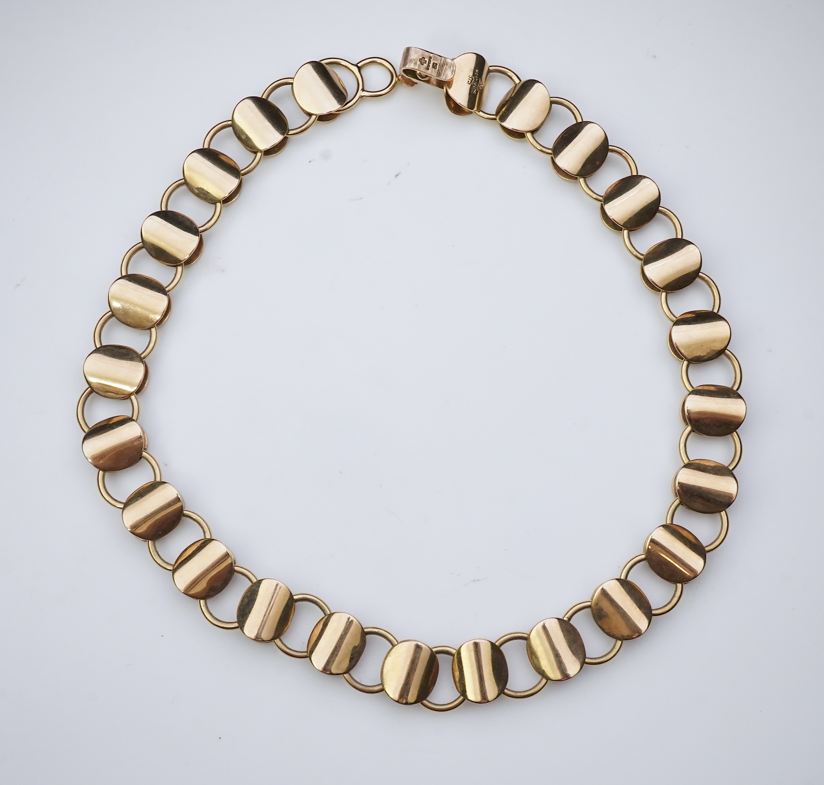 A gold necklace, circa 2000